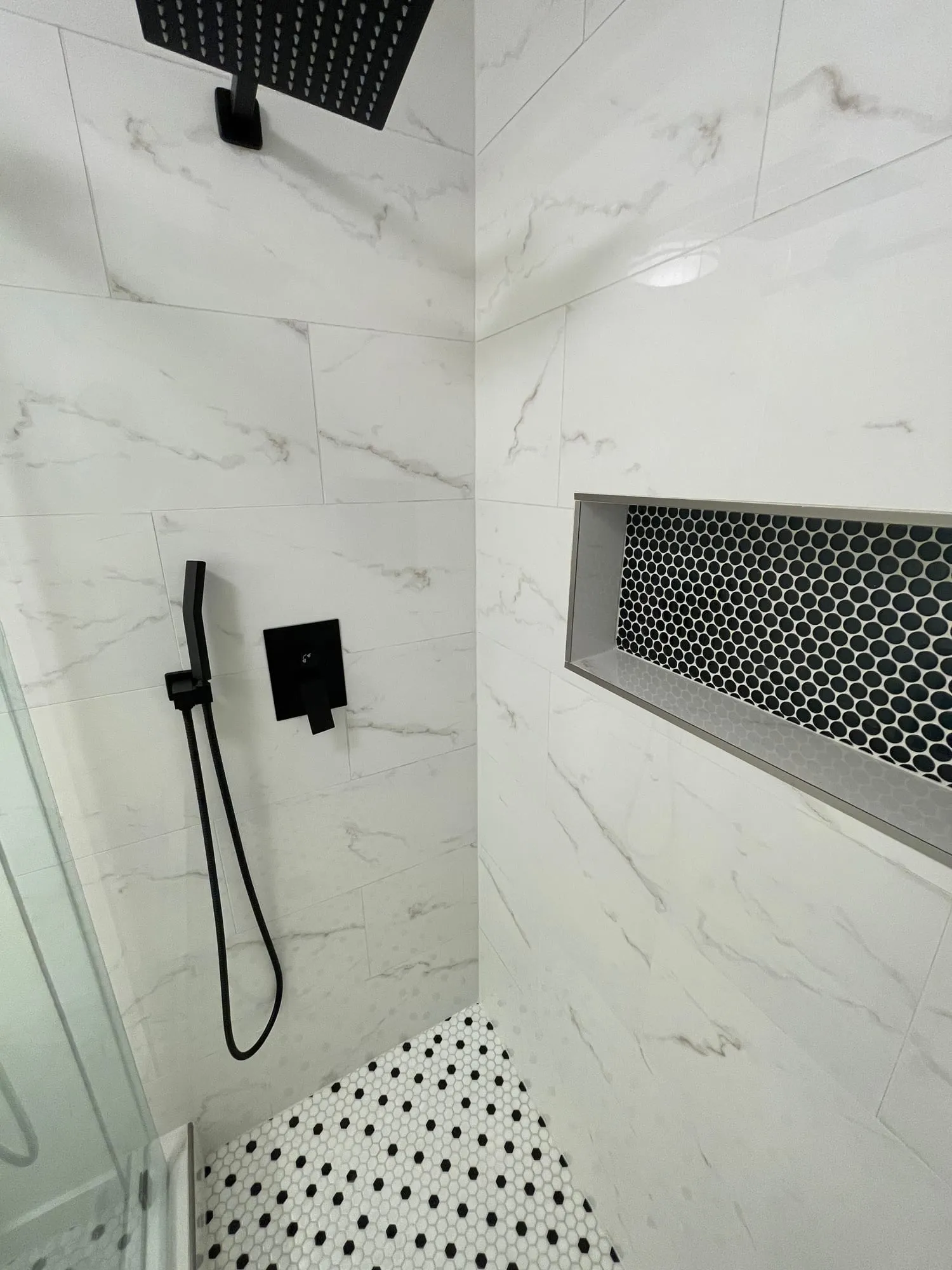 Frameless Shower with Matte Black Fixtures by PrimeSpec Construction — photo 3 of 3