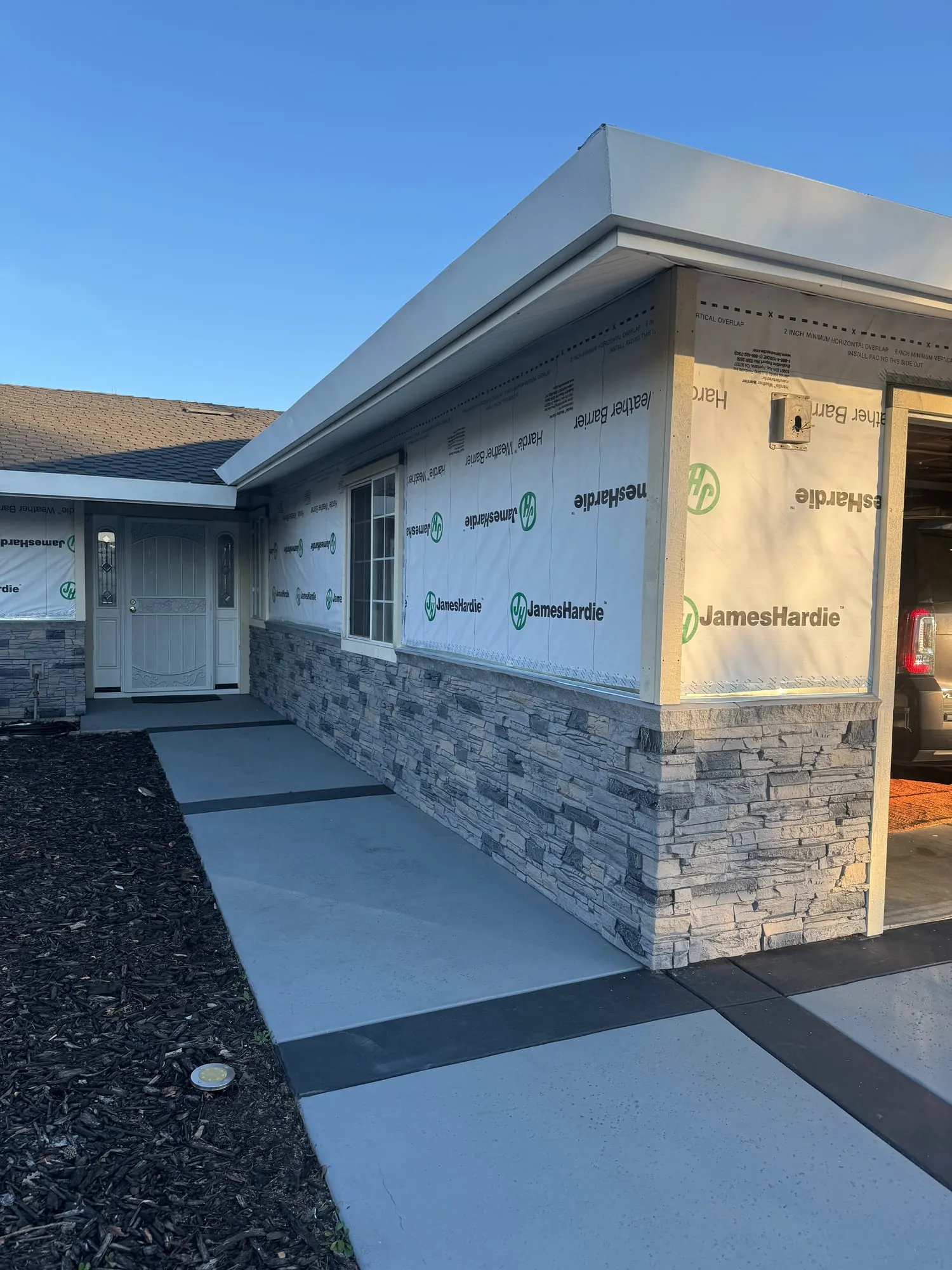 Fiber-Cement Siding & Stone Veneer by PrimeSpec Construction — photo 3 of 3