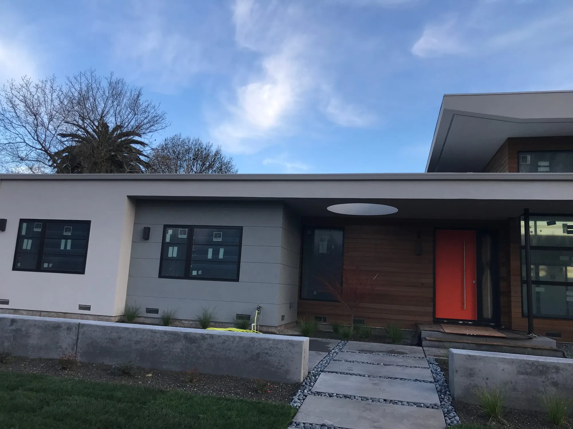 Modern Cedar & Stucco Exterior by PrimeSpec Construction — photo 1 of 8