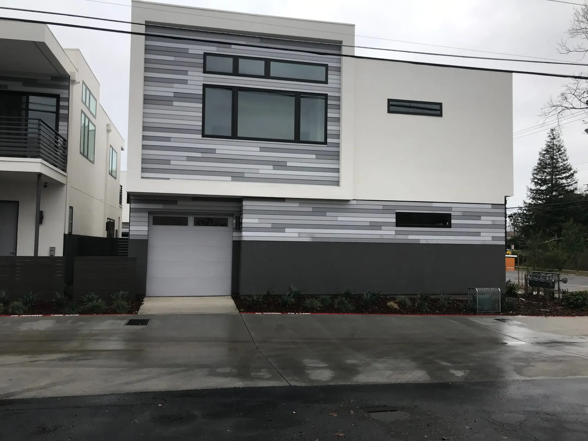 Modern Townhome Exteriors by PrimeSpec Construction — photo 2 of 4