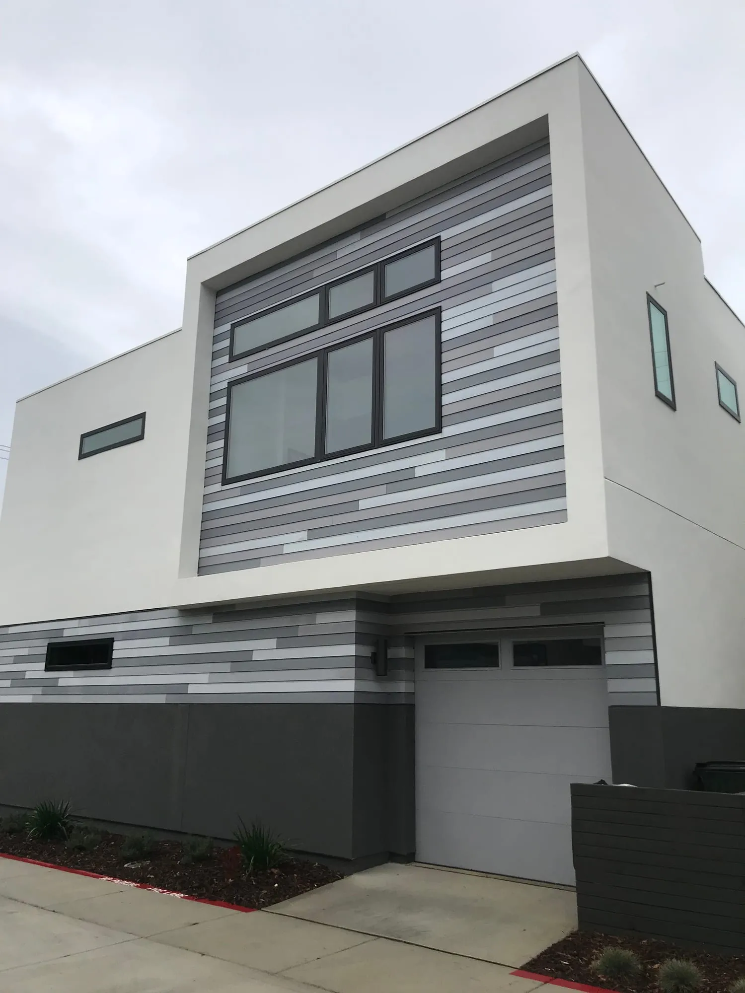 Modern Townhome Exteriors by PrimeSpec Construction — photo 3 of 4