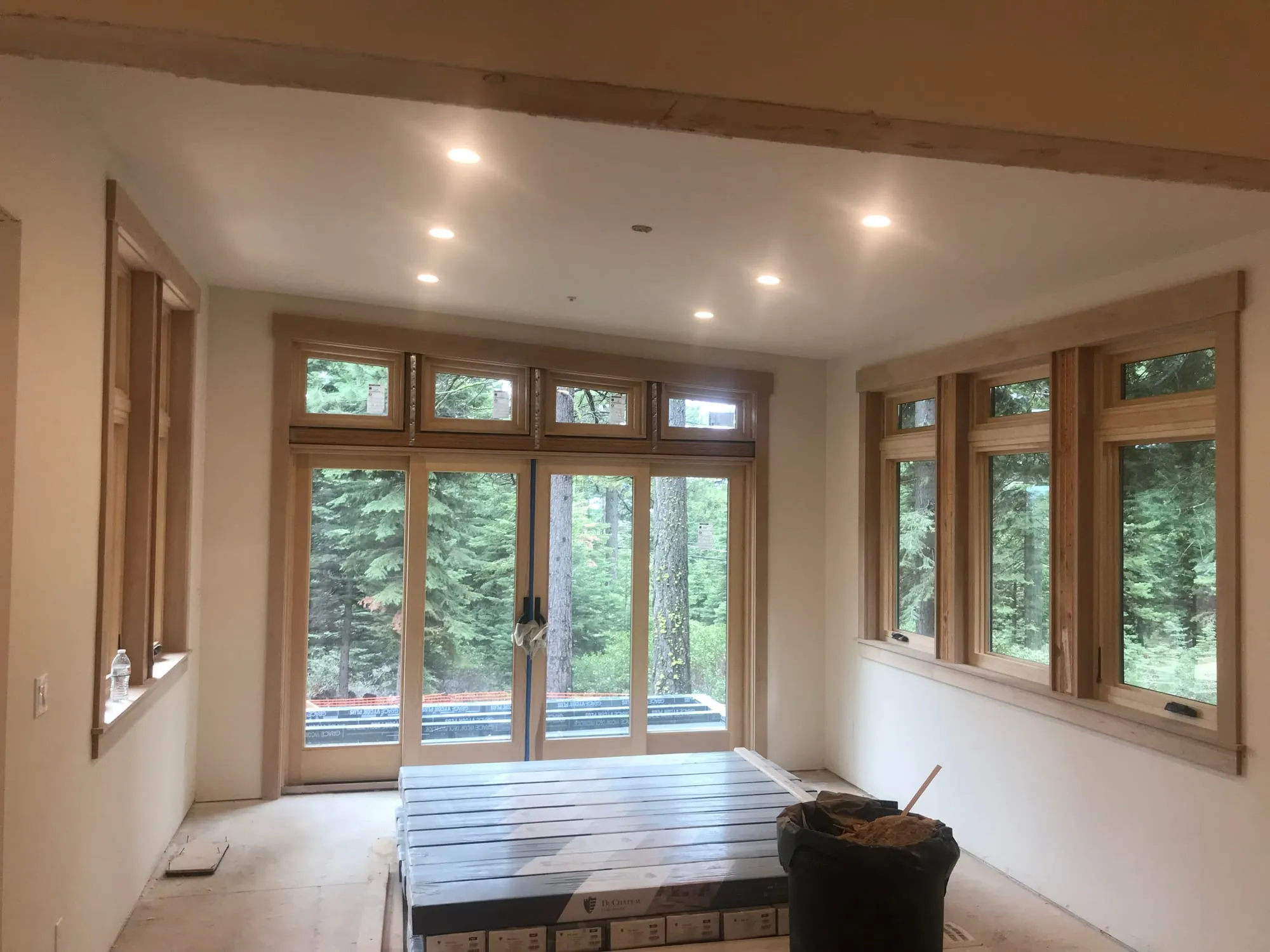 Wood-Trimmed Great Room by PrimeSpec Construction — photo 2 of 3