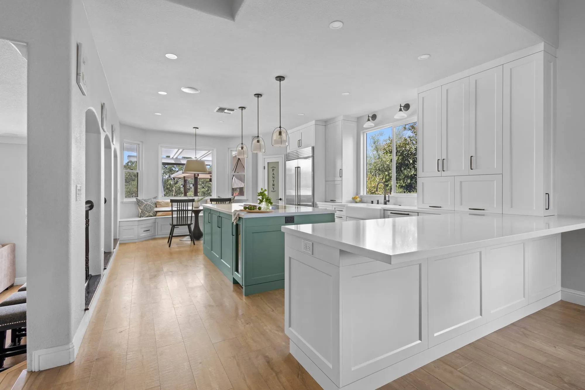 White Shaker Kitchen with Sage Island by PrimeSpec Construction — photo 8 of 16