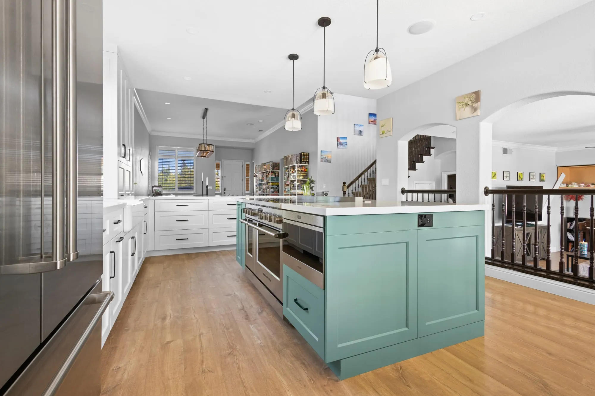 Open kitchen with sage island