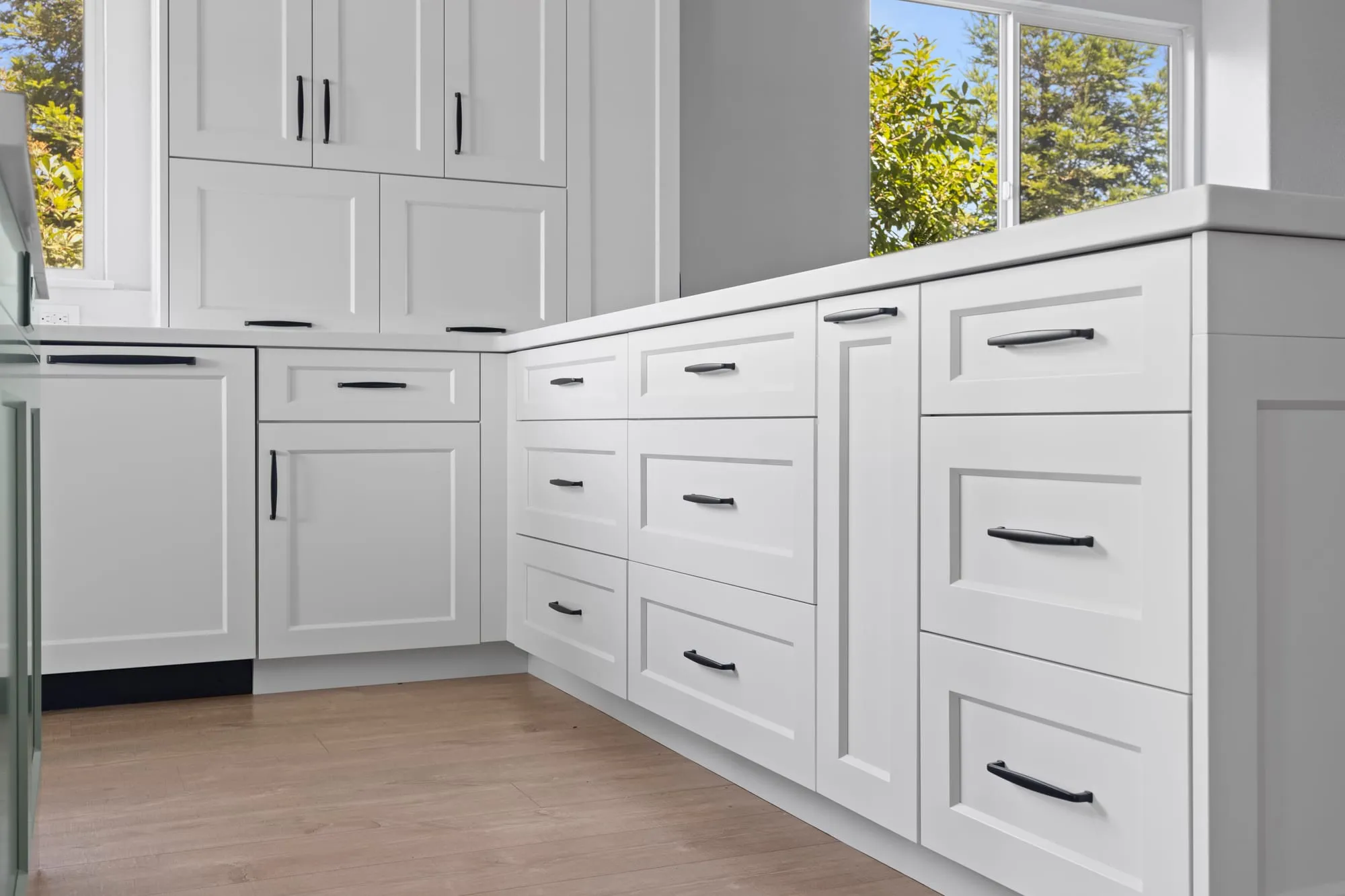 White Shaker Kitchen with Sage Island by PrimeSpec Construction — photo 10 of 16