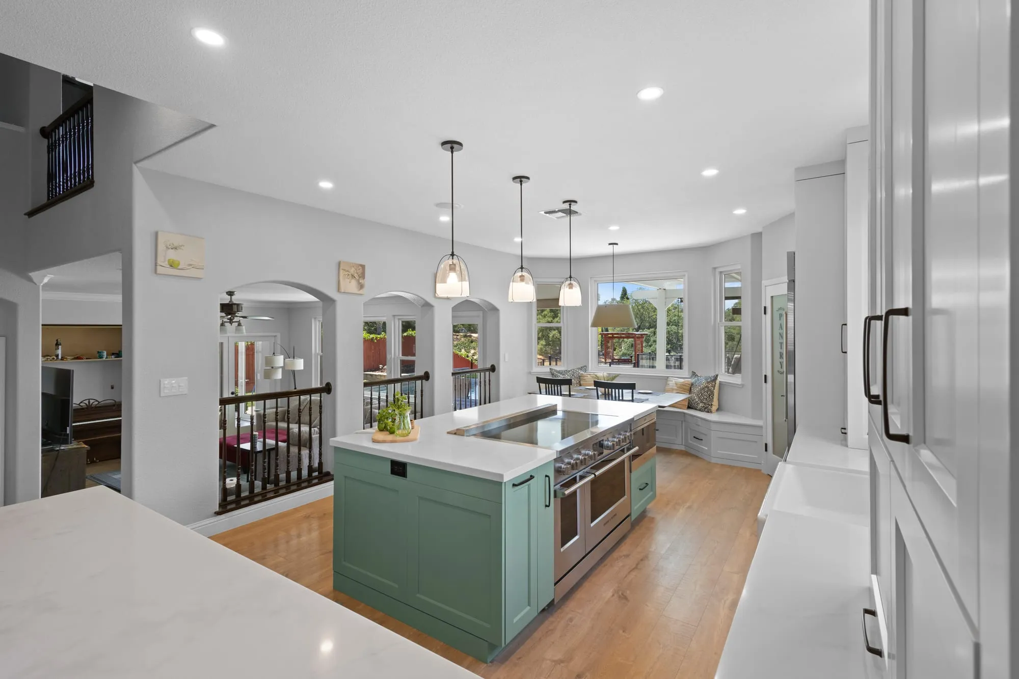 White Shaker Kitchen with Sage Island by PrimeSpec Construction — photo 11 of 16