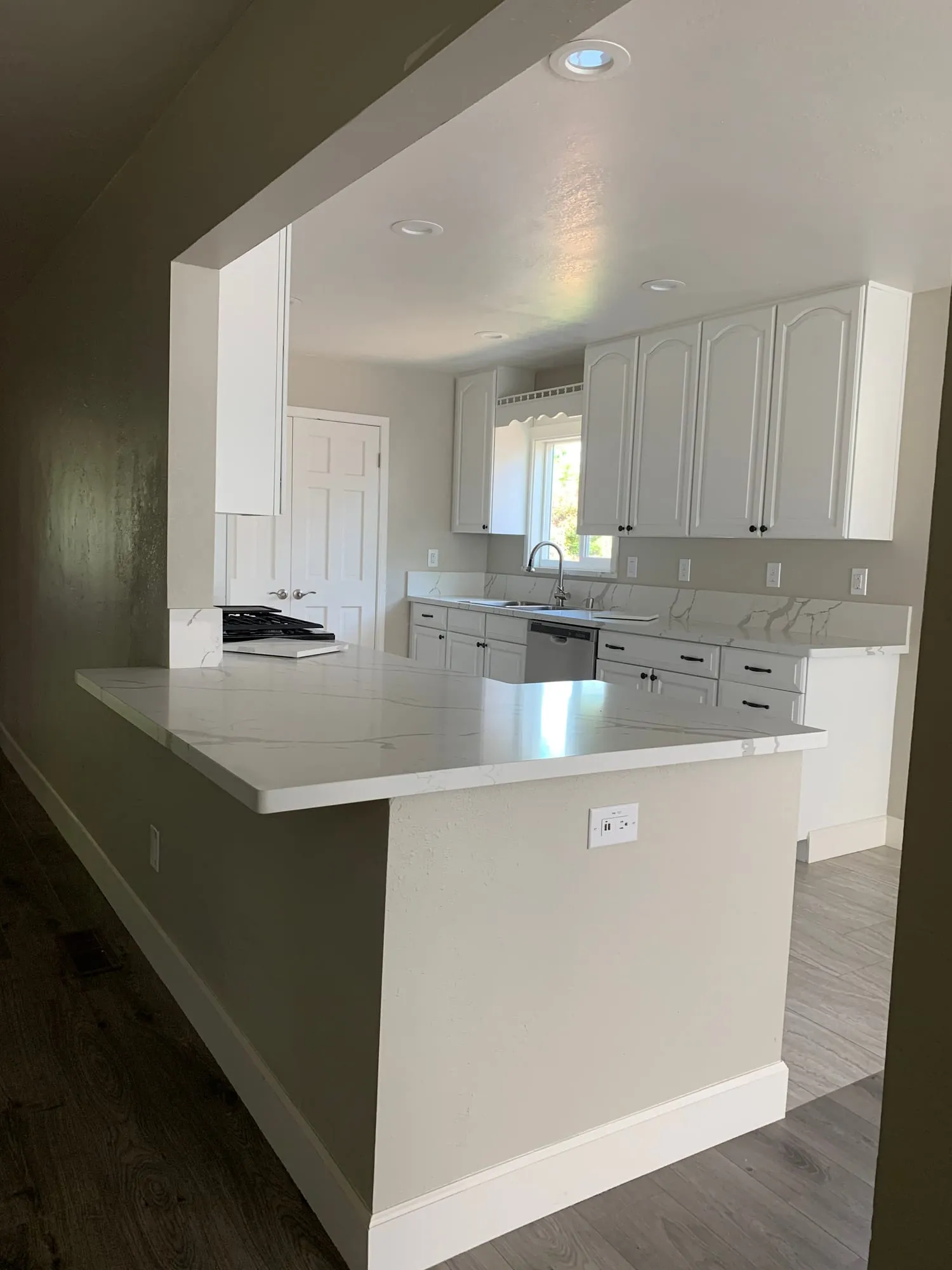 Bright White Kitchen Refresh by PrimeSpec Construction — photo 2 of 2
