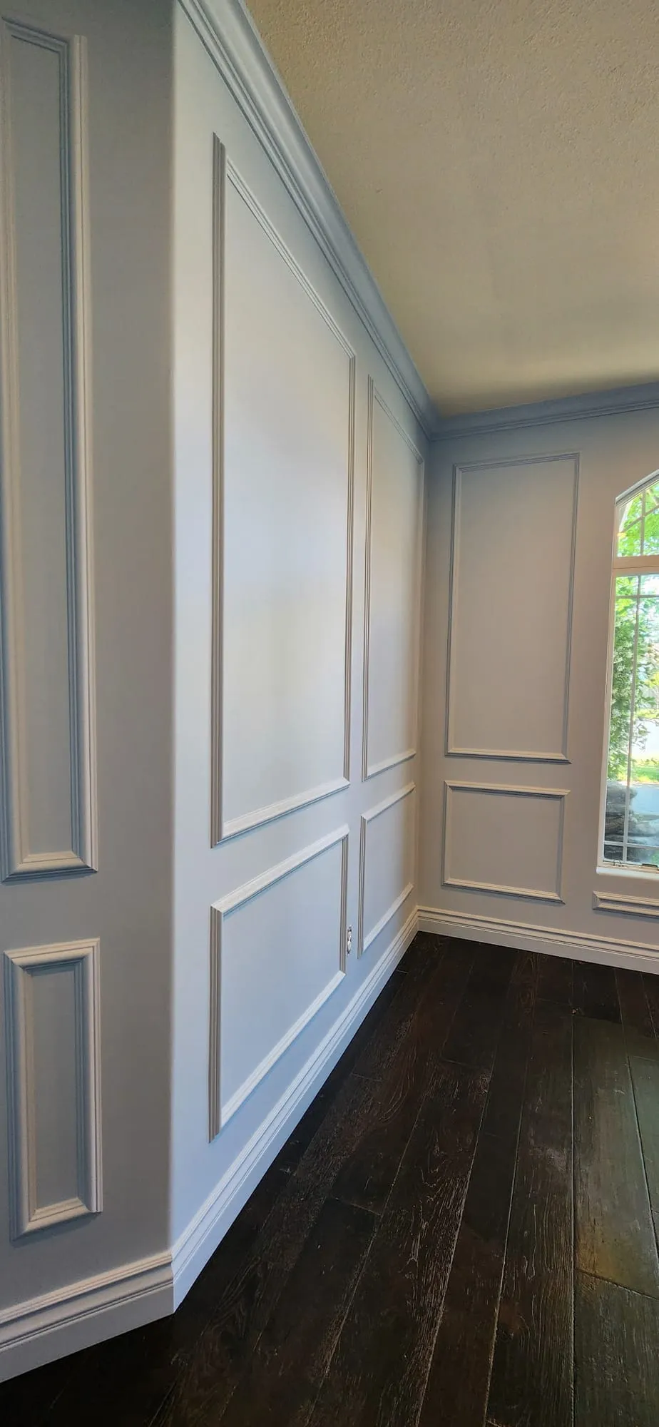 Wainscoted Staircase & Landing by PrimeSpec Construction — photo 3 of 10