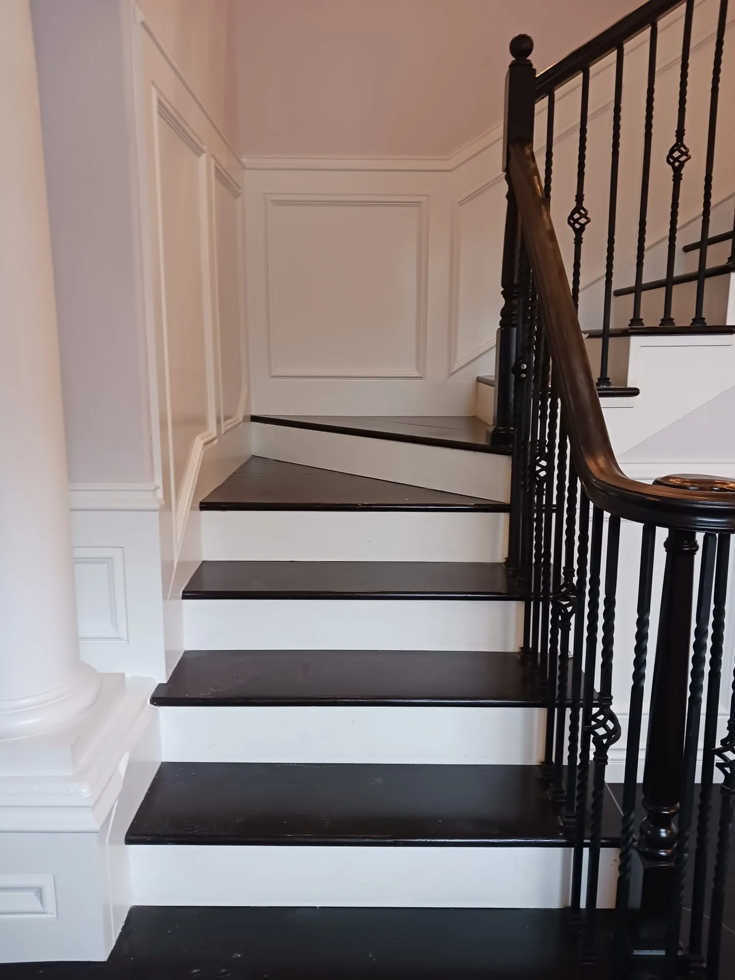 Wainscoted Staircase & Landing by PrimeSpec Construction — photo 2 of 10