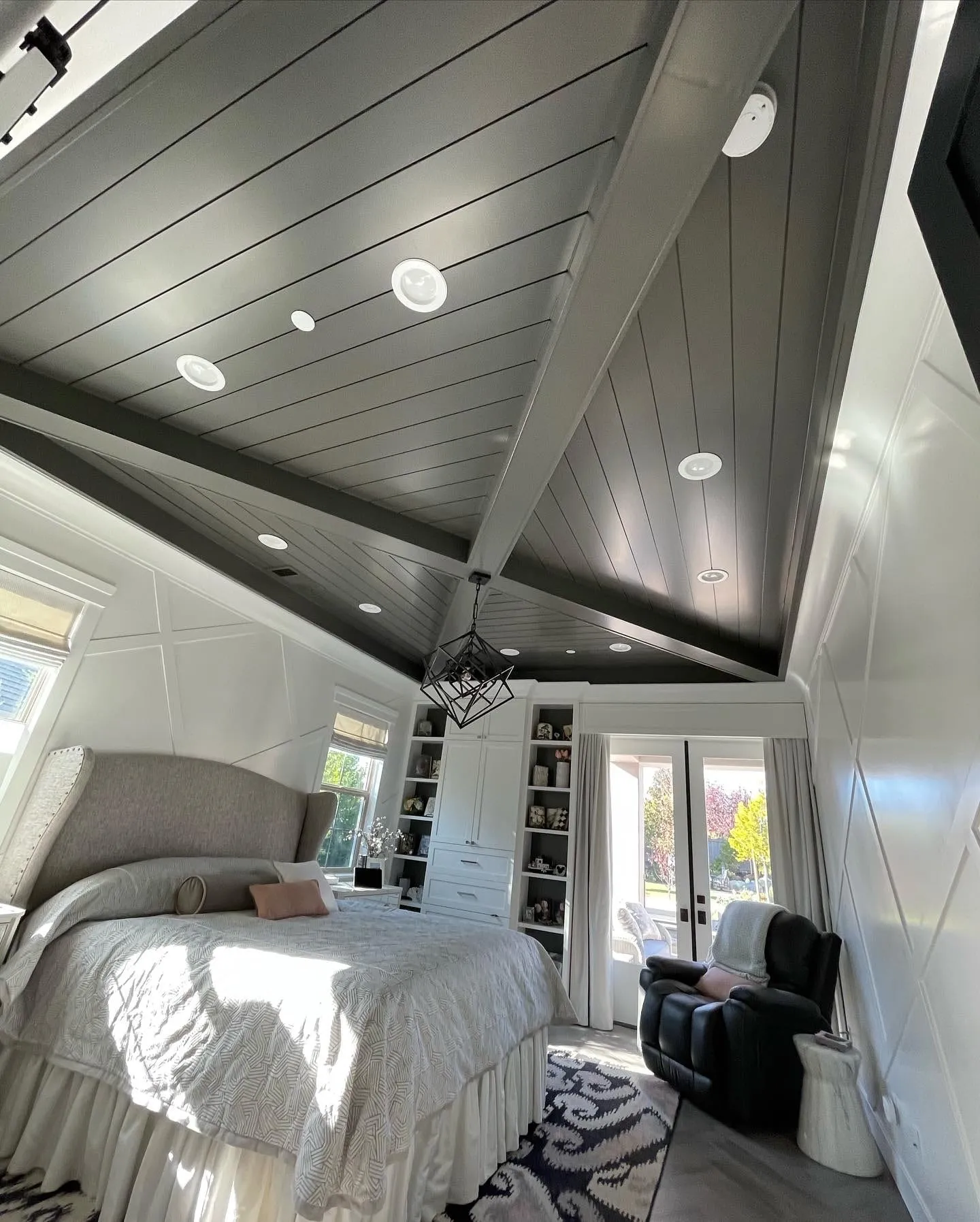 Bedroom with Dark Shiplap Ceiling by PrimeSpec Construction — photo 5 of 5