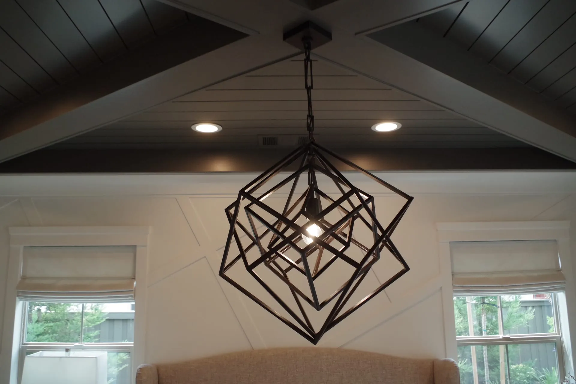 Bedroom with Dark Shiplap Ceiling by PrimeSpec Construction — photo 4 of 5