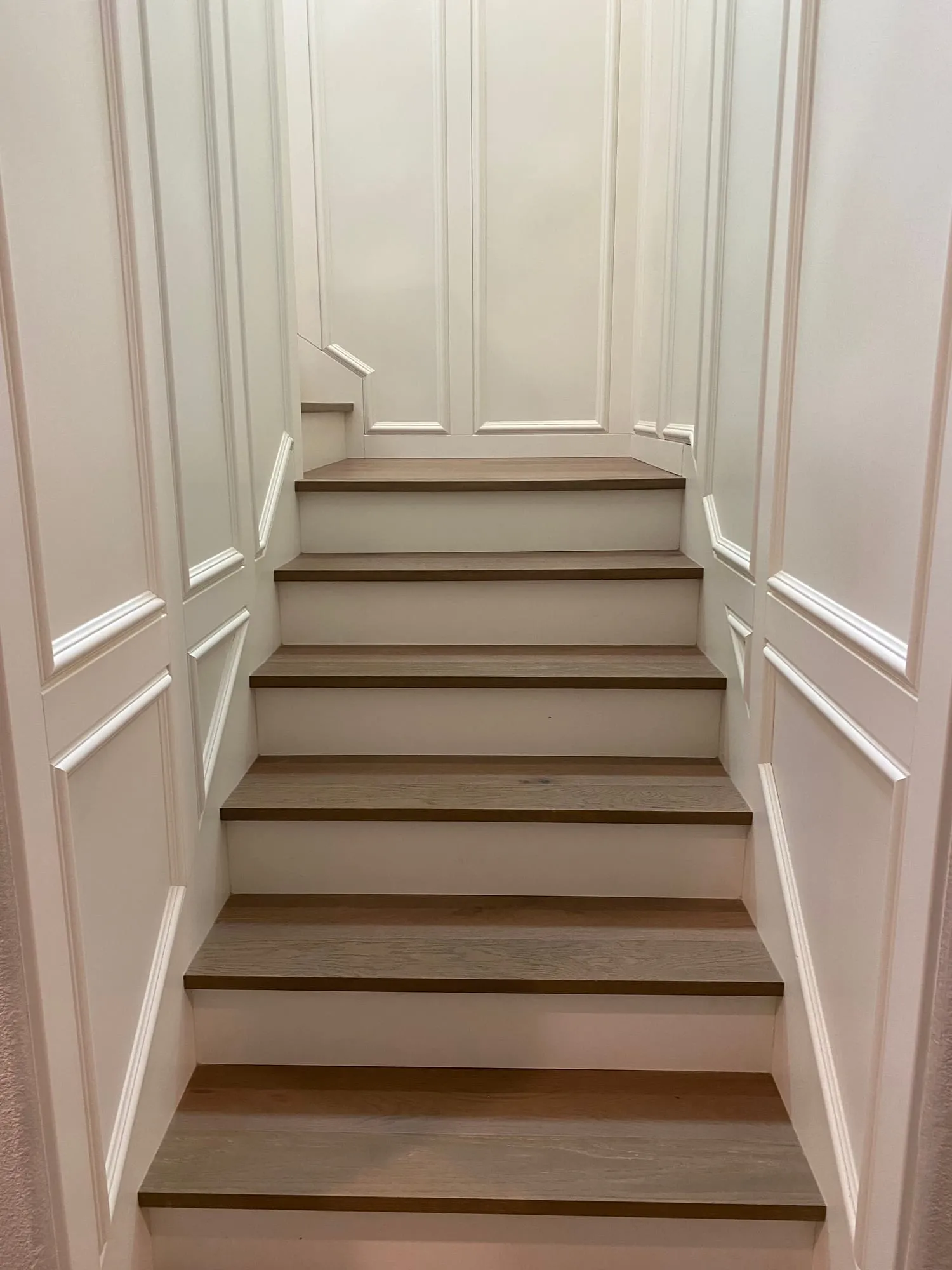 Paneled Stairwell by PrimeSpec Construction — photo 1 of 2