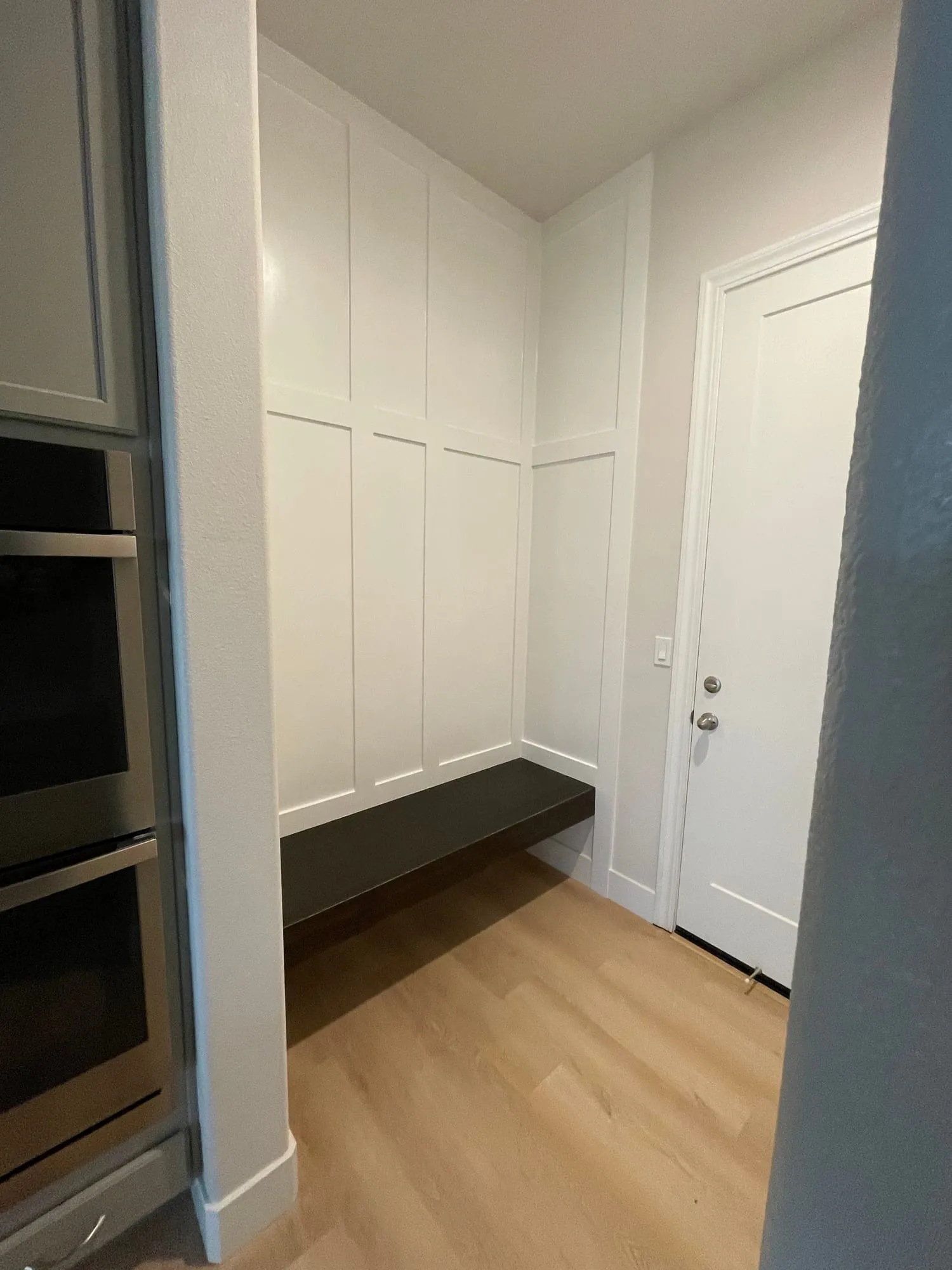 Mudroom Bench & Board and Batten by PrimeSpec Construction — photo 1 of 2