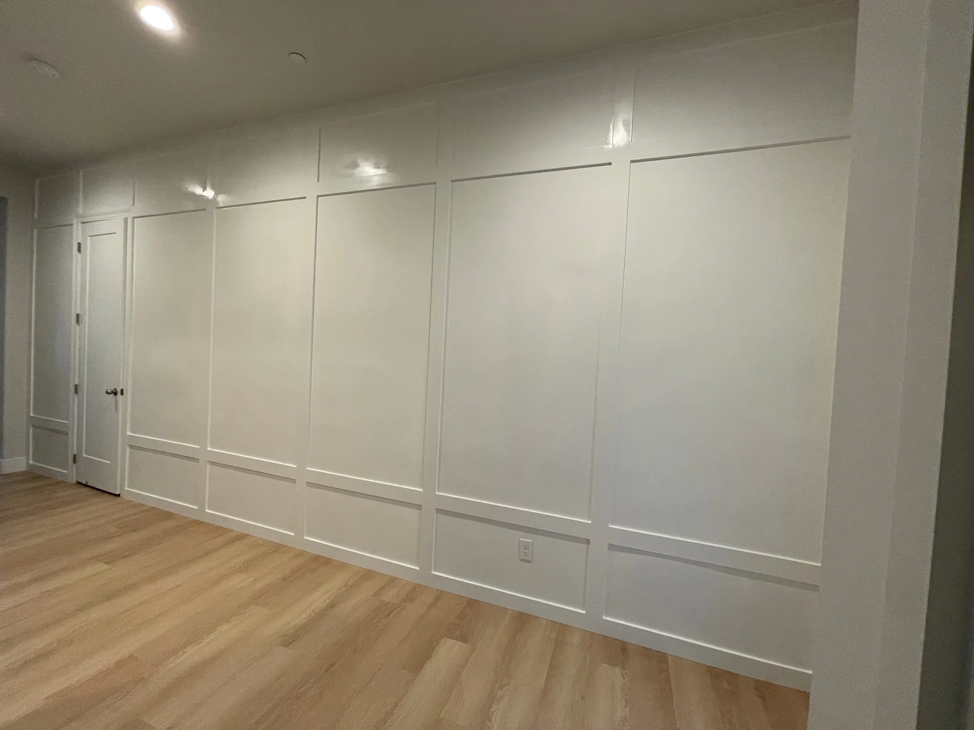 Full-height paneled hallway