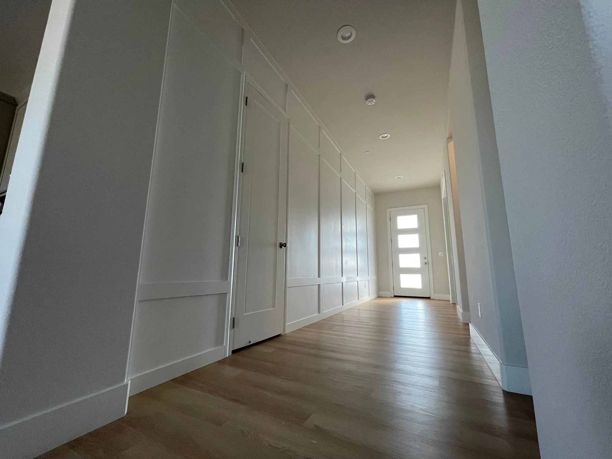 Board & Batten Hallway and Stairwell by PrimeSpec Construction — photo 3 of 9