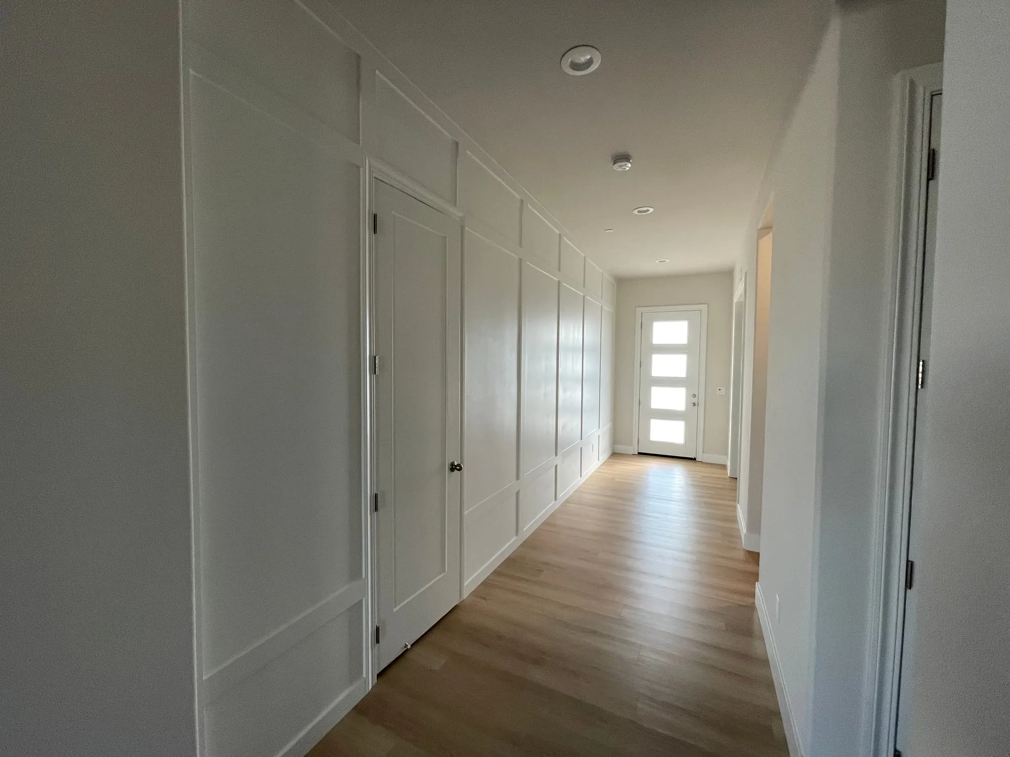 Board & Batten Hallway and Stairwell by PrimeSpec Construction — photo 4 of 9