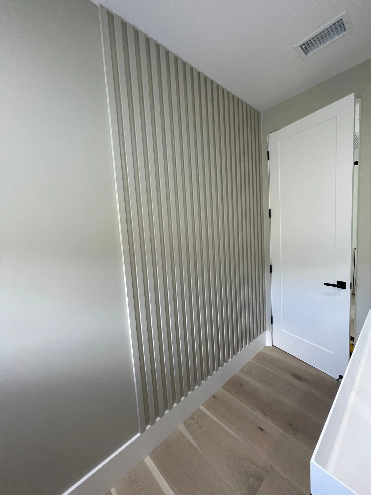 Fluted Accent Wall by PrimeSpec Construction — photo 1 of 2