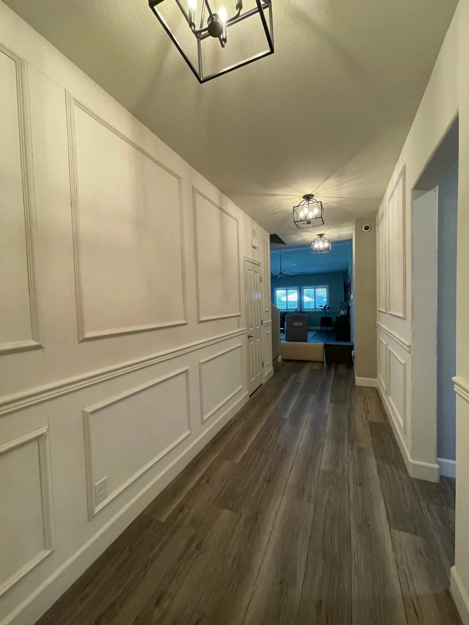 Picture-Frame Molding Hallway by PrimeSpec Construction — photo 1 of 3