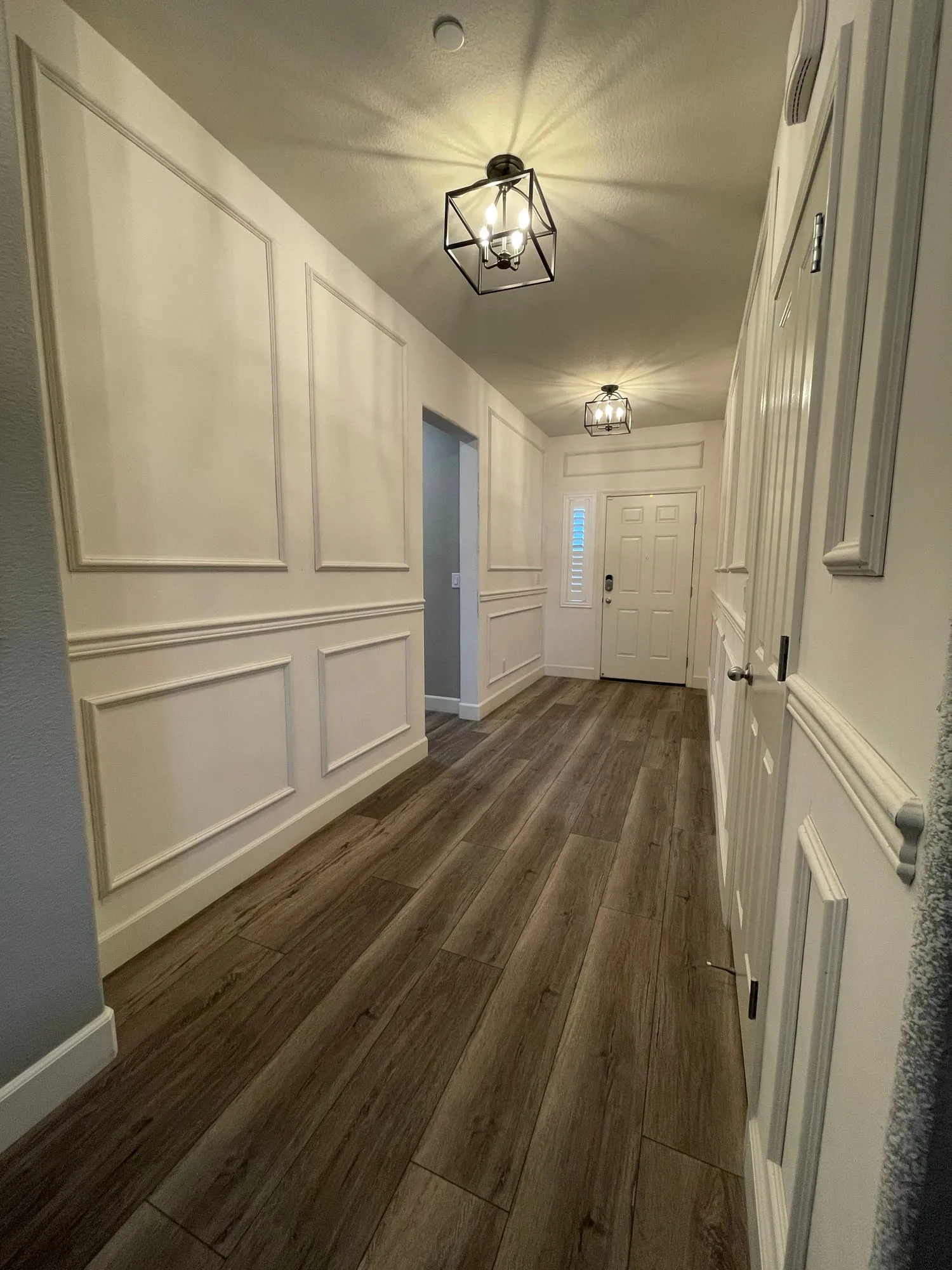 Picture-Frame Molding Hallway by PrimeSpec Construction — photo 3 of 3